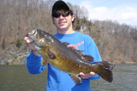Connor with a big New River smallmouth.